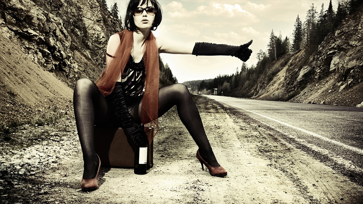 woman hitchhiking