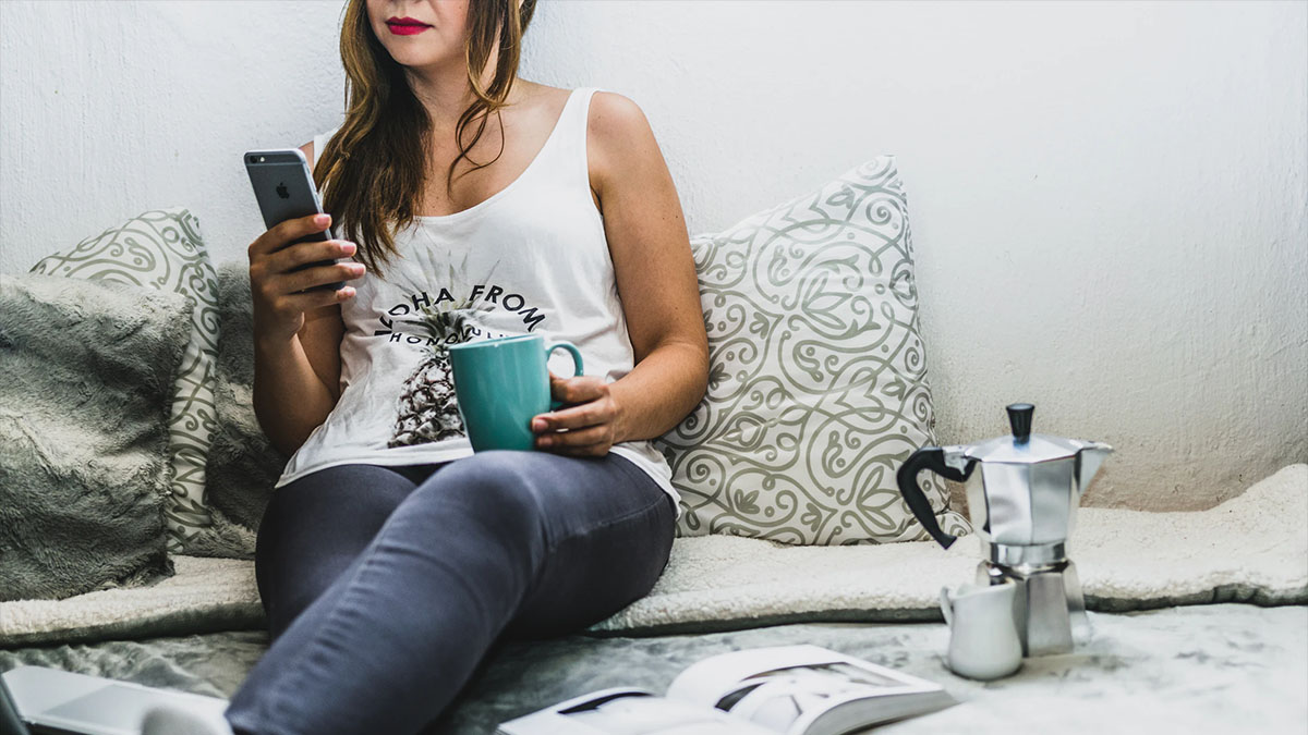 woman reading on smartphone